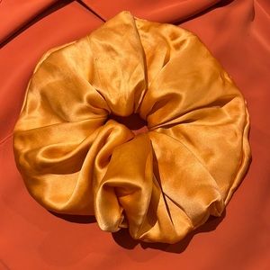 A Bronze Age XL scrunchie in 100% silk